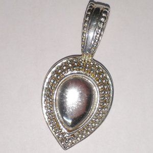 Silver toned teardrop slide